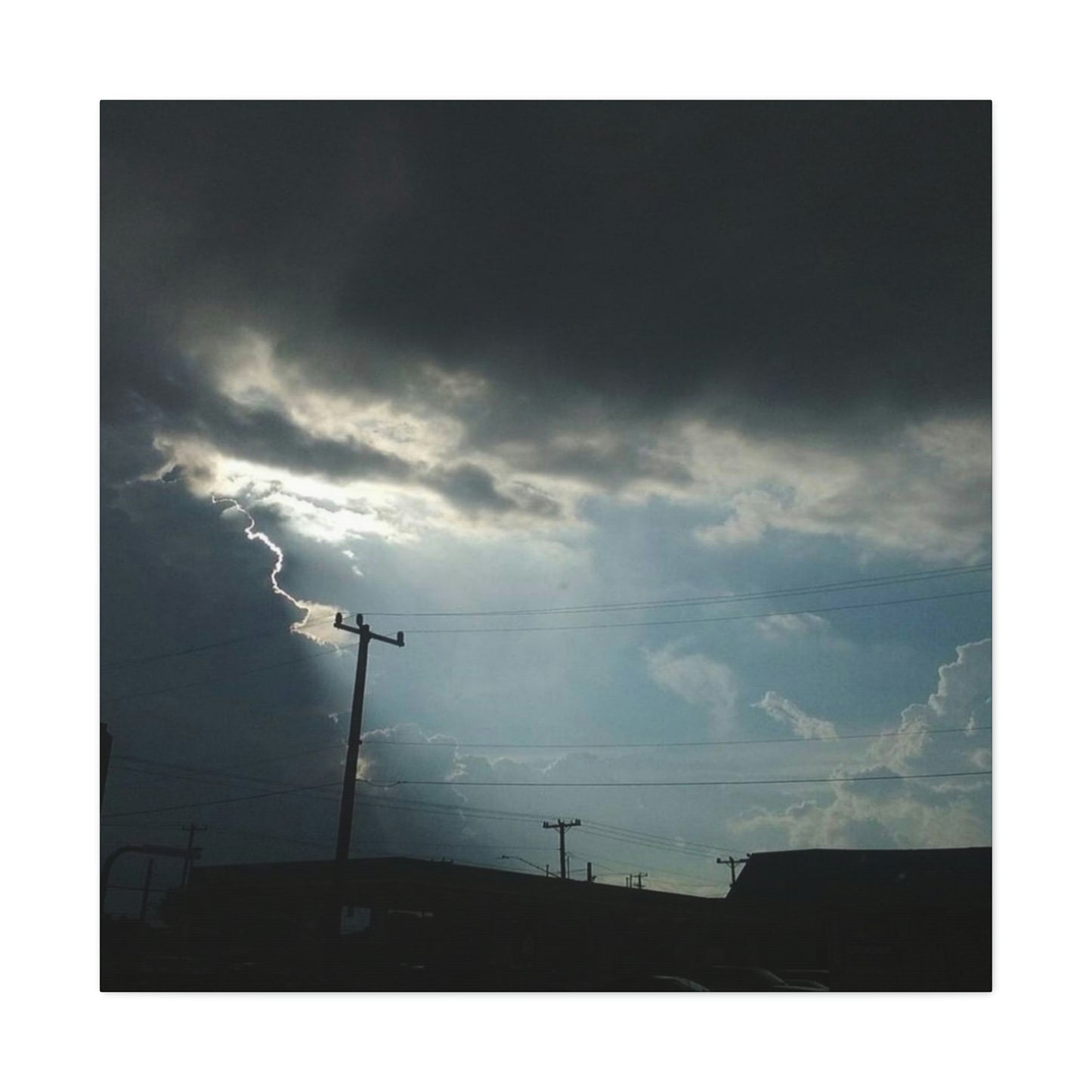 Sun Through Dark Clouds | Wall Art Canvas | Heavens Collection