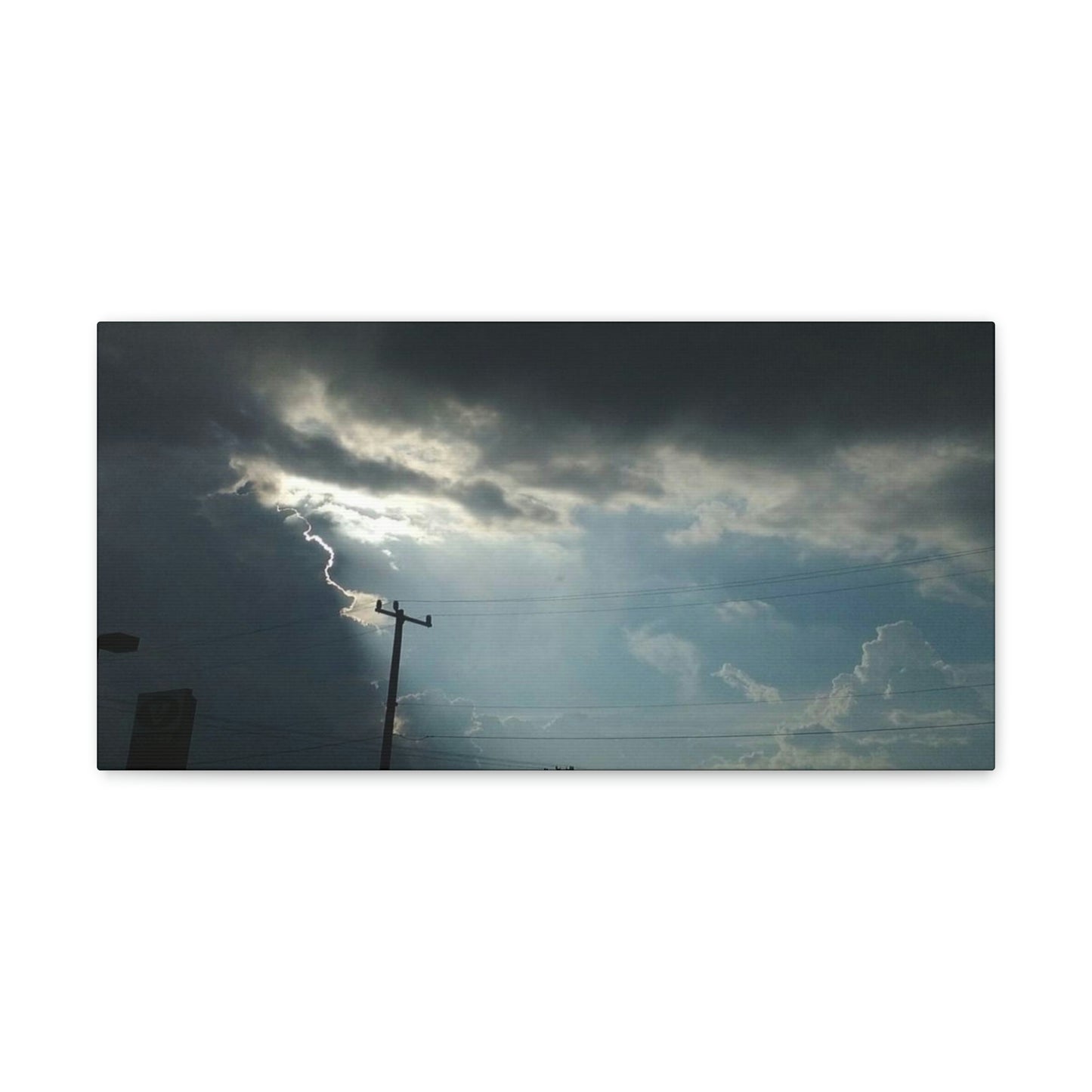 Sun Through Dark Clouds | Wall Art Canvas | Heavens Collection